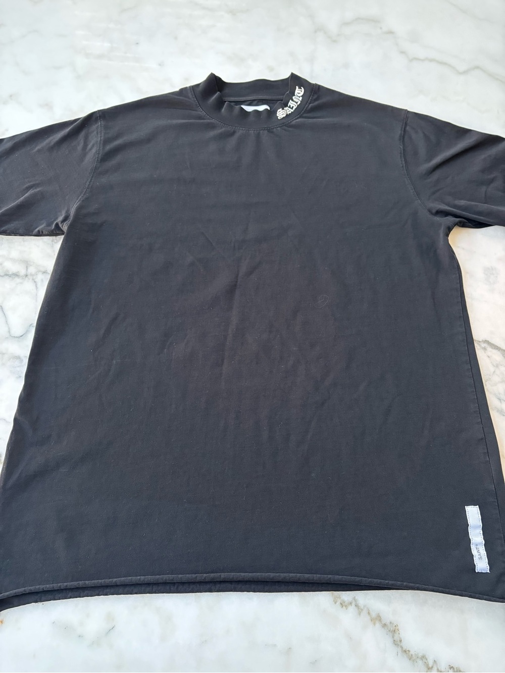 Men's Black Short-Sleeve Crewneck Tee with Subtle Neck Logo